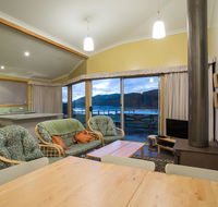 Arthur Riverfront and Sea Lodge downstream - Great Ocean Road Tourism